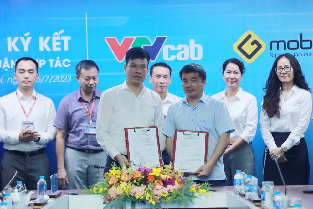 gmobile va vtvcab ky ket thoa thuan hop tac toan dien